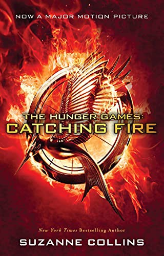 Suzanne Collins: Catching Fire Movie-Tie-in-Edition [Paperback] [Nov 10, 2014] SUZANNE COLLINS (Paperback, Scholastic India)